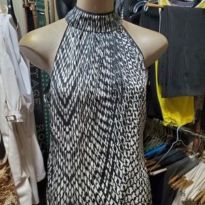 NWT...Satiny Cache top.  Black & white, Sz Small